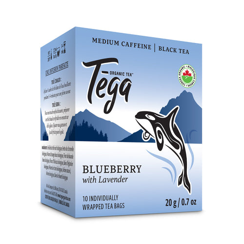 Blueberry Lavender Organic Tea packaging featuring Tega brand and mountain scenery with bold blue colors.